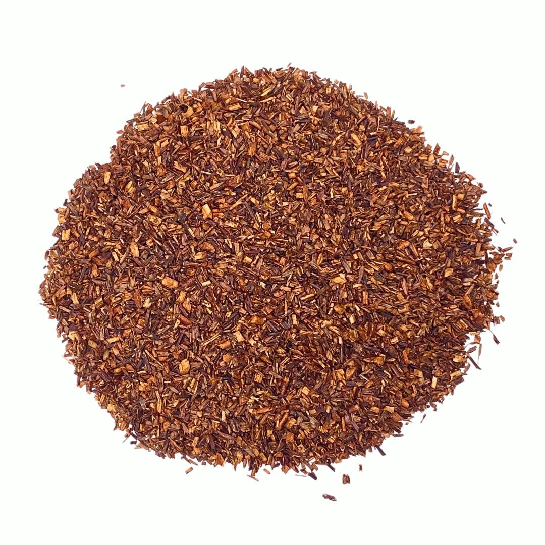 A pile of organic loose leaf honeybusy tea.