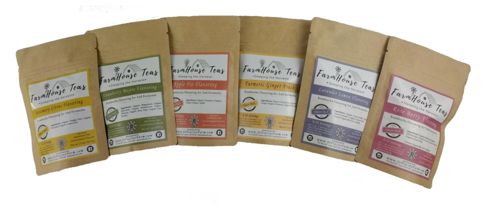 Variety of kombucha flavor packs arranged in a flat lay