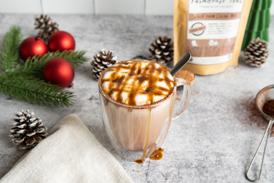 Hush’Room Cocoa Mix package with measured serving of cocoa powder