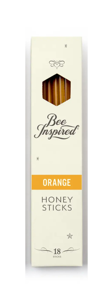 Packaging of 'Orange Honey Sticks' with 'Bee Inspired' branding on a white background.