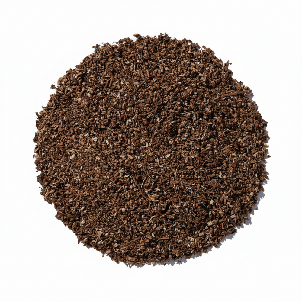 A top-down view of a pile of dark brown dandelion granules
